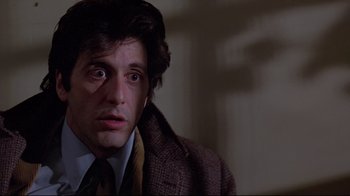 Movie still from “And Justice for All” (1979), directed by Norman Jewison – Al pacino wearing a suit and tie; Close Up shot, Low angle