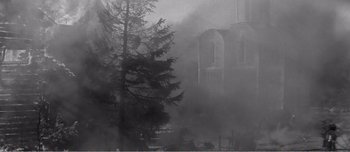 Movie still from “Andrei Rublev” (1966), directed by Andrei Tarkovsky – A black and white photo of a church in the fog; Extreme Wide shot, Low angle