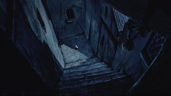 Movie still from “Angel's Egg” (1985), directed by Mamoru Oshii – An image of an empty staircase in a dark place; Extreme Wide shot, High angle