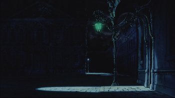 Movie still from “Angel's Egg” (1985), directed by Mamoru Oshii – A street light lit up at night in the dark; Extreme Wide shot, Low angle