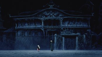 Movie still from “Angel's Egg” (1985), directed by Mamoru Oshii – Two people standing in front of a large building; Extreme Wide shot, Low angle
