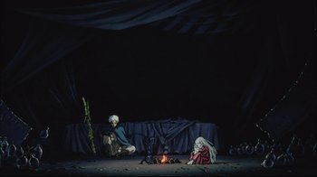Movie still from “Angel's Egg” (1985), directed by Mamoru Oshii – A scene of a stage with a fire in the middle of the stage; Wide shot, High angle