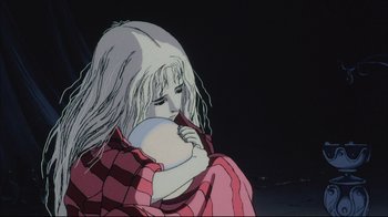 Movie still from “Angel's Egg” (1985), directed by Mamoru Oshii – An animated woman holding a baby in her arms; Close Up shot, Low angle