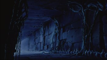 Movie still from “Angel's Egg” (1985), directed by Mamoru Oshii – A scene with trees and rocks in the background; Extreme Wide shot, High angle