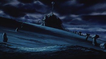 Movie still from “Angel's Egg” (1985), directed by Mamoru Oshii – A dark sky with a mountain in the background; Extreme Wide shot, Low angle
