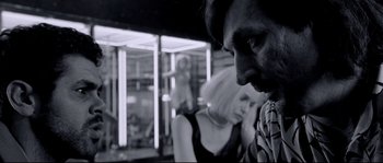 Movie still from “Angel-A” (2005), directed by Luc Besson – A man and a woman are looking at each other; Close Up shot, Over the shoulder angle