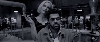 Movie still from “Angel-A” (2005), directed by Luc Besson – A man and a woman standing next to each other; Close Up shot, Low angle