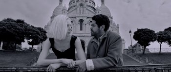 A man and a woman sitting next to each other