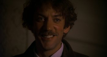 Movie still from “National Lampoon's Animal House” (1978), directed by John Landis – A person with a mustache; Close Up shot, Low angle