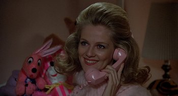 Movie still from “National Lampoon's Animal House” (1978), directed by John Landis – A woman holding a phone up to her ear; Close Up shot, Low angle