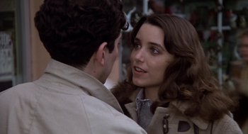 Movie still from “National Lampoon's Animal House” (1978), directed by John Landis – A man and a woman talking to each other; Close Up shot, Over the shoulder angle