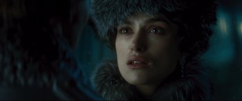 Movie still from “Anna Karenina” (2012), directed by Joe Wright – A person wearing a fur hat; Close Up shot, Over the shoulder angle