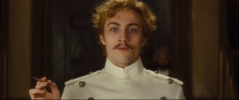 Movie still from “Anna Karenina” (2012), directed by Joe Wright – A person wearing a uniform; Close Up shot, Low angle
