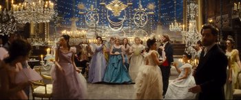 Movie still from “Anna Karenina” (2012), directed by Joe Wright – A group of people dressed up in fancy gowns; Wide shot, Low angle