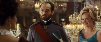 Movie still from “Anna Karenina” (2012), directed by Joe Wright – A man in a uniform with a beard and mustache; Close Up shot, Low angle