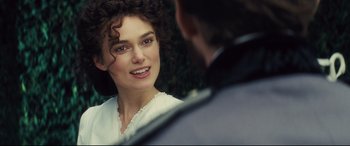 Movie still from “Anna Karenina” (2012), directed by Joe Wright – A person talking to another person; Close Up shot, Over the shoulder angle