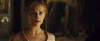 Movie still from “Anna Karenina” (2012), directed by Joe Wright – A young woman is looking into the camera; Close Up shot, Over the shoulder angle