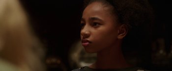 Movie still from “Annabelle: Creation” (2017), directed by David F. Sandberg – A young person looking to the side; Close Up shot, Low angle