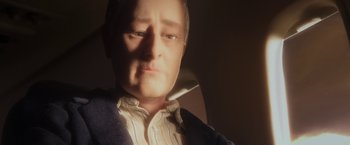 Movie still from “Anomalisa” (2015), directed by Duke Johnson – A man's face in the light; Extreme Close Up shot, High angle