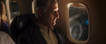 Movie still from “Anomalisa” (2015), directed by Duke Johnson – An older man looking out the window of an airplane; Close Up shot, High angle