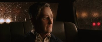 Movie still from “Anomalisa” (2015), directed by Duke Johnson – A man's face in the dark; Close Up shot, High angle