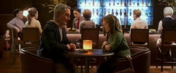 Movie still from “Anomalisa” (2015), directed by Duke Johnson – A man and a woman sitting at a table in front of a lit candle; Medium shot, Over the shoulder angle