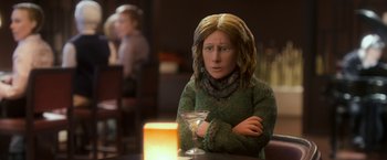 Movie still from “Anomalisa” (2015), directed by Duke Johnson – A woman sitting at a table with a glass of wine; Close Up shot, Over the shoulder angle
