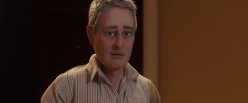 Movie still from “Anomalisa” (2015), directed by Duke Johnson – A person wearing a striped shirt; Close Up shot, Over the shoulder angle