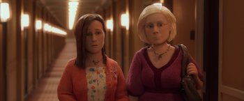 Movie still from “Anomalisa” (2015), directed by Duke Johnson – A couple of women standing next to each other in a room; Close Up shot, High angle