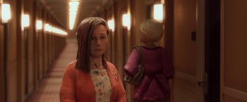 Movie still from “Anomalisa” (2015), directed by Duke Johnson – A woman in a red jacket standing next to another woman in a pink jacket; Close Up shot, Over the shoulder angle