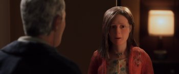 Movie still from “Anomalisa” (2015), directed by Duke Johnson – A woman is looking in the mirror while a man looks on; Close Up shot, Over the shoulder angle