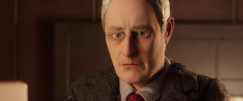 Movie still from “Anomalisa” (2015), directed by Duke Johnson – A man's face in a suit and tie; Close Up shot, Low angle