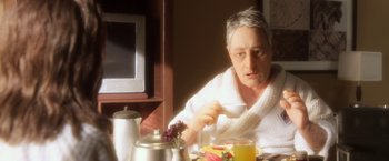 Movie still from “Anomalisa” (2015), directed by Duke Johnson – An older man sitting in front of a bowl of food; Close Up shot, Low angle