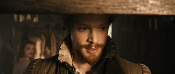 Movie still from “Anonymous” (2011), directed by Roland Emmerich – A person with a beard; Close Up shot, High angle