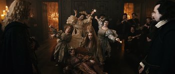 Movie still from “Anonymous” (2011), directed by Roland Emmerich – A group of people dressed in renaissance costumes; Wide shot, Overhead angle