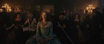 Movie still from “Anonymous” (2011), directed by Roland Emmerich – A group of people sitting in a room; Wide shot, Over the shoulder angle