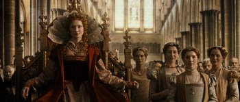 Movie still from “Anonymous” (2011), directed by Roland Emmerich – A group of women standing next to each other in a room; Medium shot, Low angle