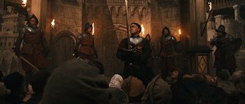 Movie still from “Anonymous” (2011), directed by Roland Emmerich – A group of people dressed in medieval clothing; Wide shot, Low angle