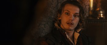 Movie still from “Anonymous” (2011), directed by Roland Emmerich – A person with long hair; Close Up shot, Over the shoulder angle