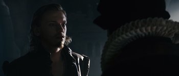 Movie still from “Anonymous” (2011), directed by Roland Emmerich – A man with long hair is looking at another man with long hair; Close Up shot, Over the shoulder angle