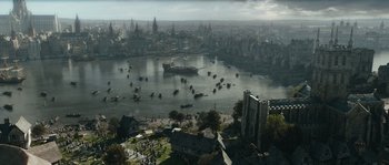 Movie still from “Anonymous” (2011), directed by Roland Emmerich – An aerial view of a city with a large body of water; Extreme Wide shot, High angle