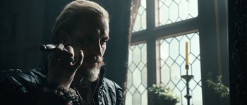 Movie still from “Anonymous” (2011), directed by Roland Emmerich – A person with a beard and mustache; Close Up shot, Over the shoulder angle