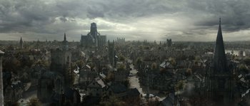 Movie still from “Anonymous” (2011), directed by Roland Emmerich – An aerial view of an old town with a castle in the background; Extreme Wide shot, High angle