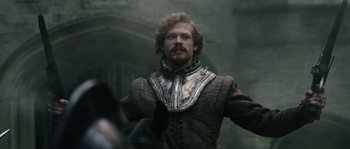 Movie still from “Anonymous” (2011), directed by Roland Emmerich – A person wearing a costume; Medium shot, Over the shoulder angle