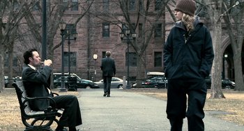Movie still from “Another Earth” (2011), directed by Mike Cahill – A man and a woman walking down a street; Wide shot, Over the shoulder angle