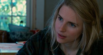 Movie still from “Another Earth” (2011), directed by Mike Cahill – A person with long blonde hair; Close Up shot, Over the shoulder angle