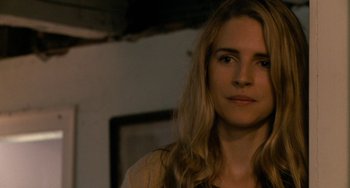 Movie still from “Another Earth” (2011), directed by Mike Cahill – A person with long blonde hair; Close Up shot, Over the shoulder angle