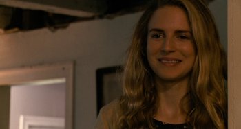 Movie still from “Another Earth” (2011), directed by Mike Cahill – A person with long hair; Close Up shot, Over the shoulder angle