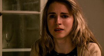 Movie still from “Another Earth” (2011), directed by Mike Cahill – A person with long blonde hair; Close Up shot, Over the shoulder angle