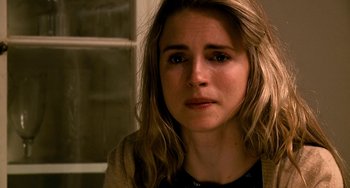 Movie still from “Another Earth” (2011), directed by Mike Cahill – A person with long blonde hair; Close Up shot, Over the shoulder angle